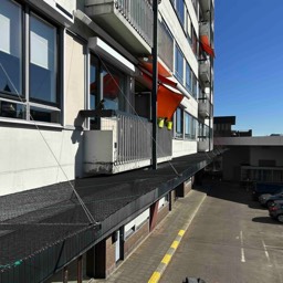 Hasselt Flatgebouw anti steenval netten